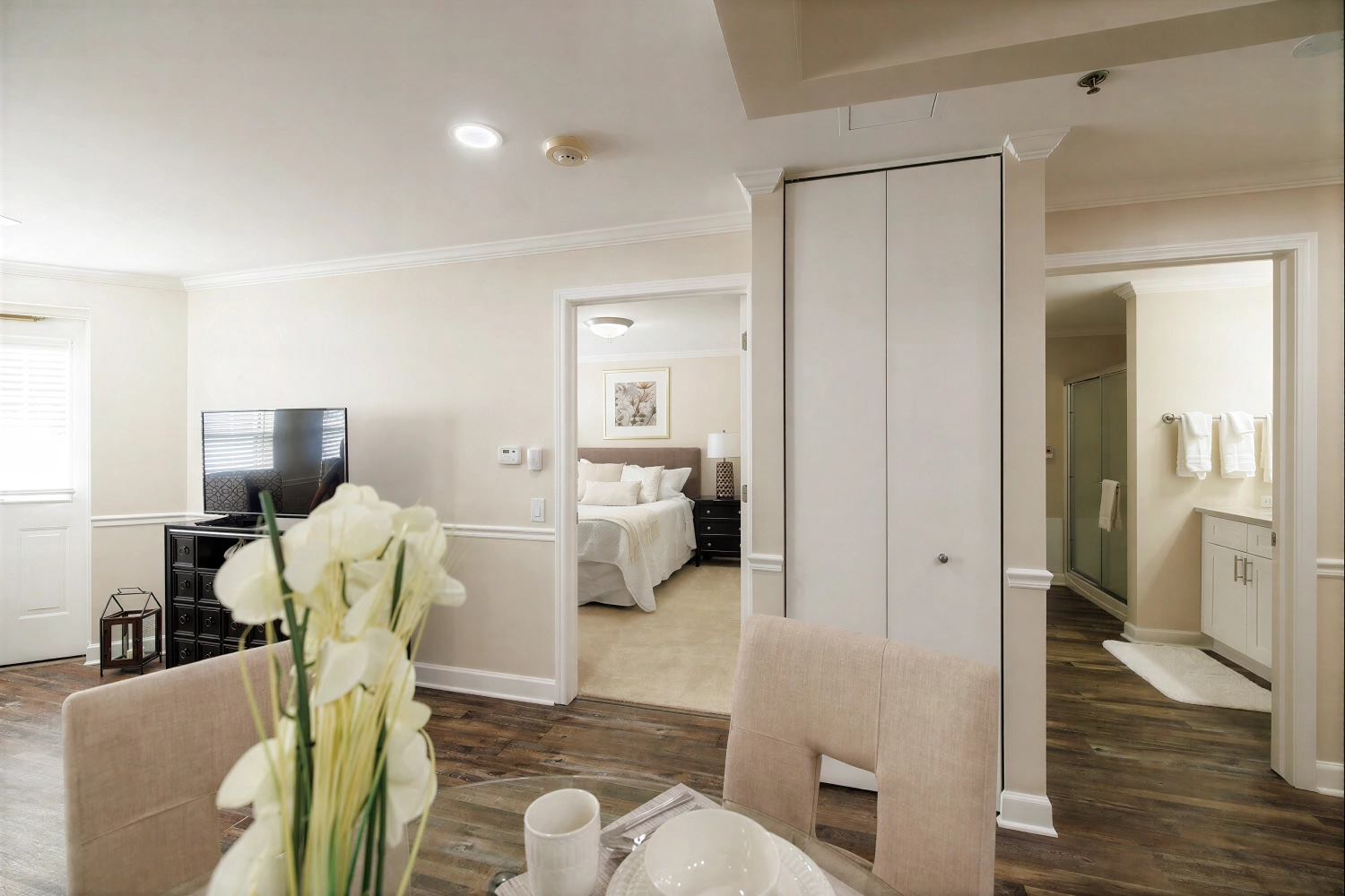 Modern apartment interior with bedroom and bathroom view