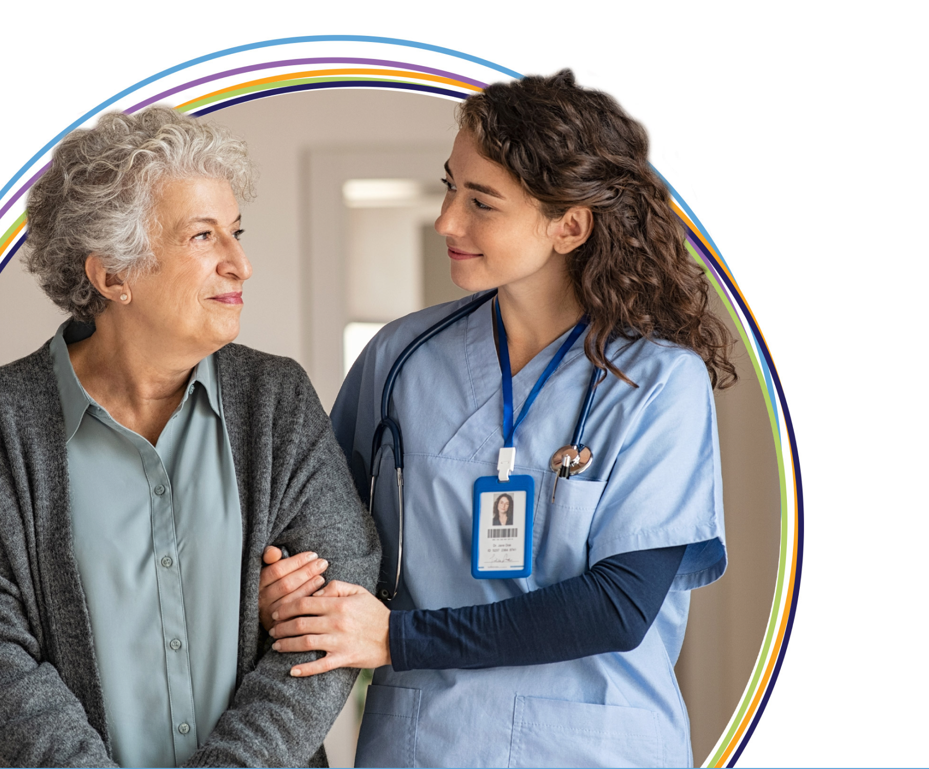 Nurse supporting elderly woman in clinic