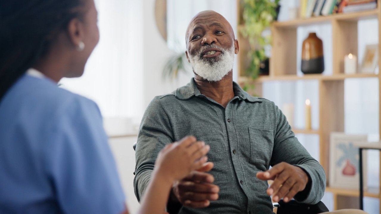 Older man speaking during counseling session